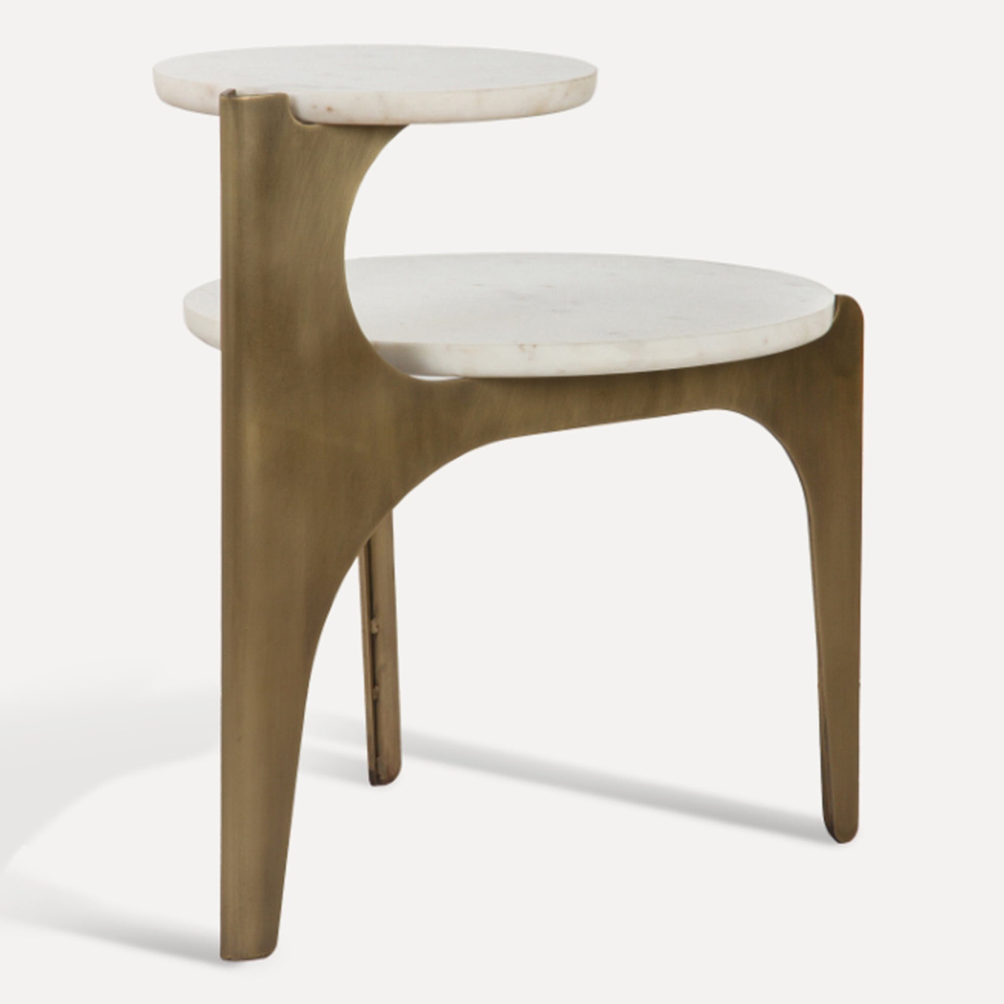 A modern two-tier side table featuring round white marble tabletops and a sculptural, curved bronze metal frame, shown against a plain white background.