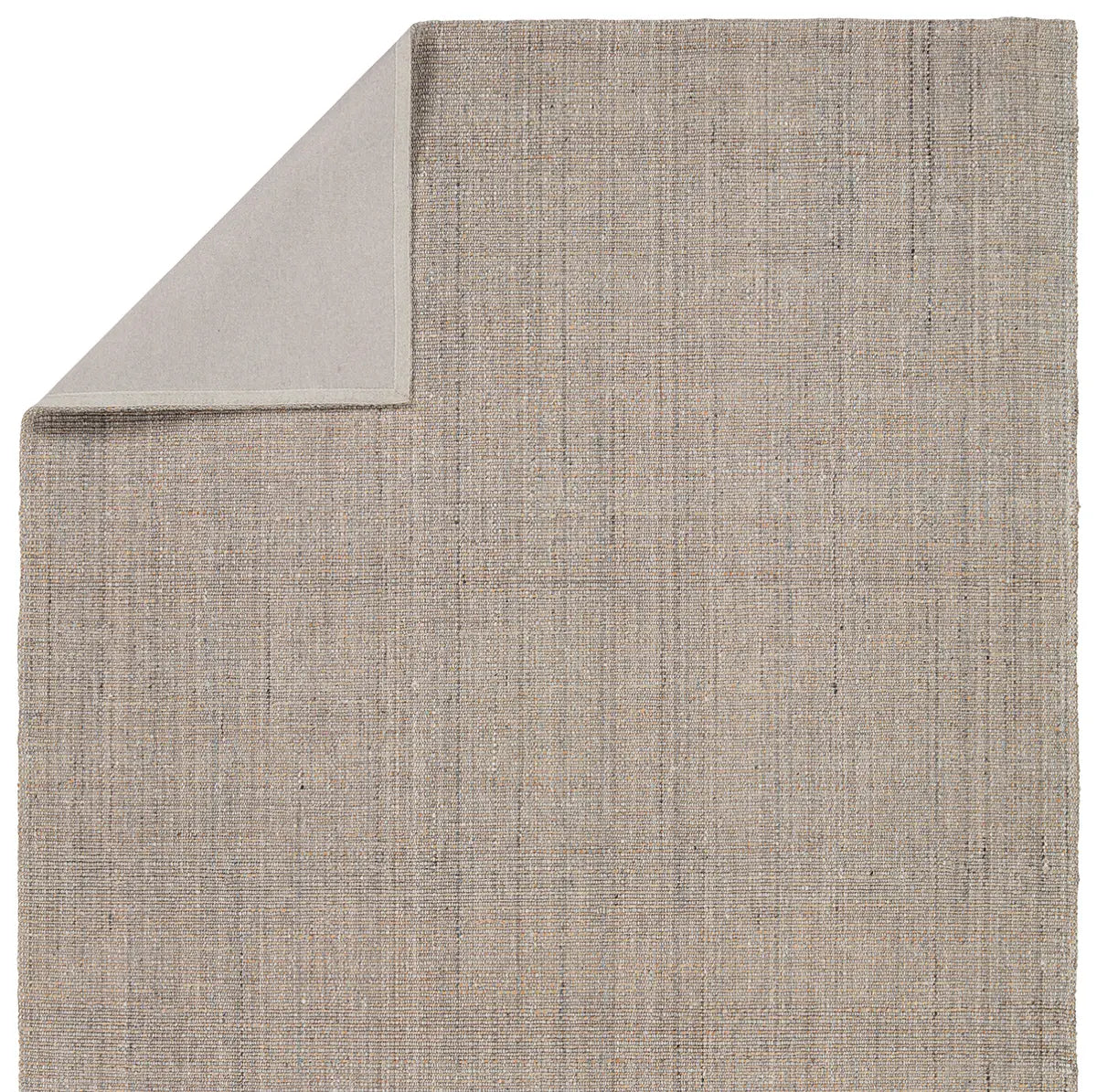 Textured beige rug with a contrasting border on a white background
