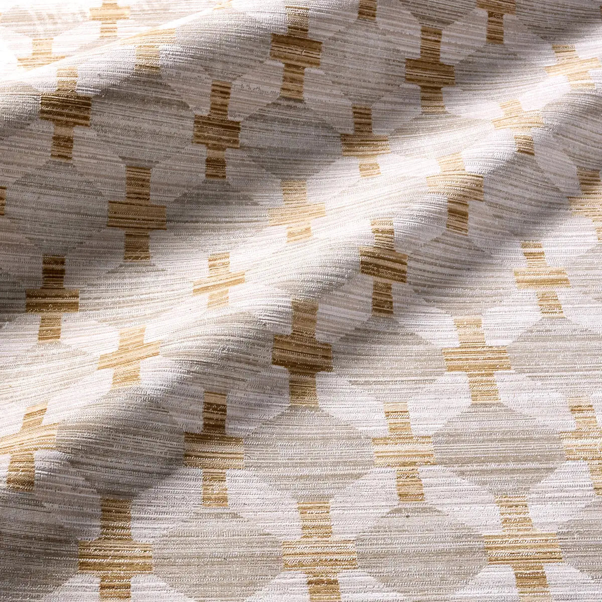 Textured fabric with geometric pattern in beige and brown tones