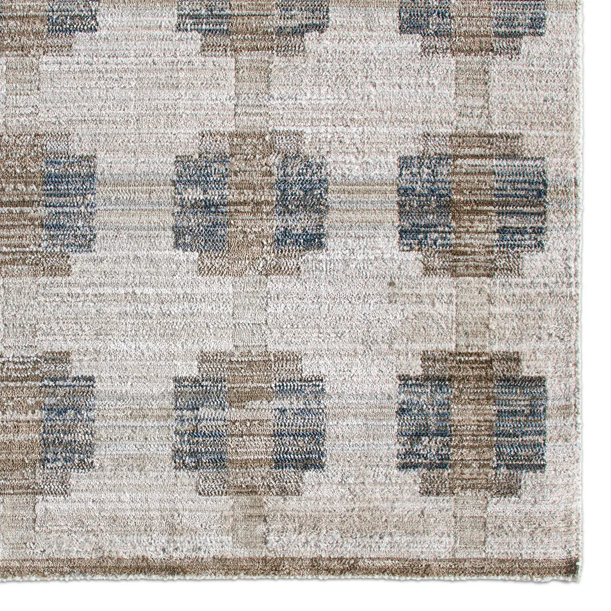 Patterned rug with geometric design in neutral colors