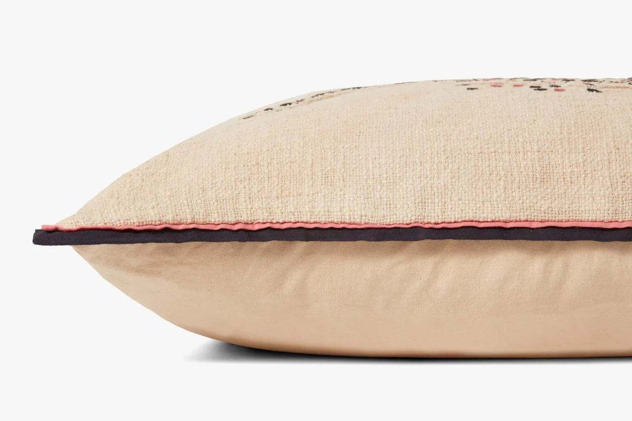 Beige pillow with red stitching on a white background