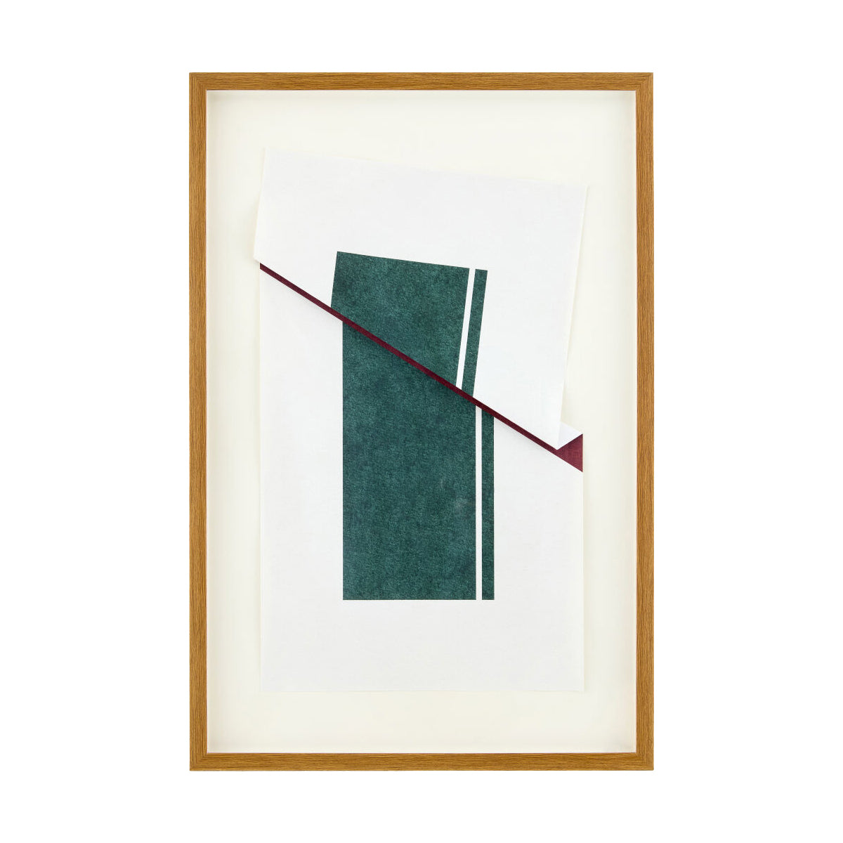 A framed abstract art print featuring a minimalist geometric design with a dark green textured rectangle, white vertical stripes, and a diagonal burgundy line, set in a light wood frame with a white mat.
