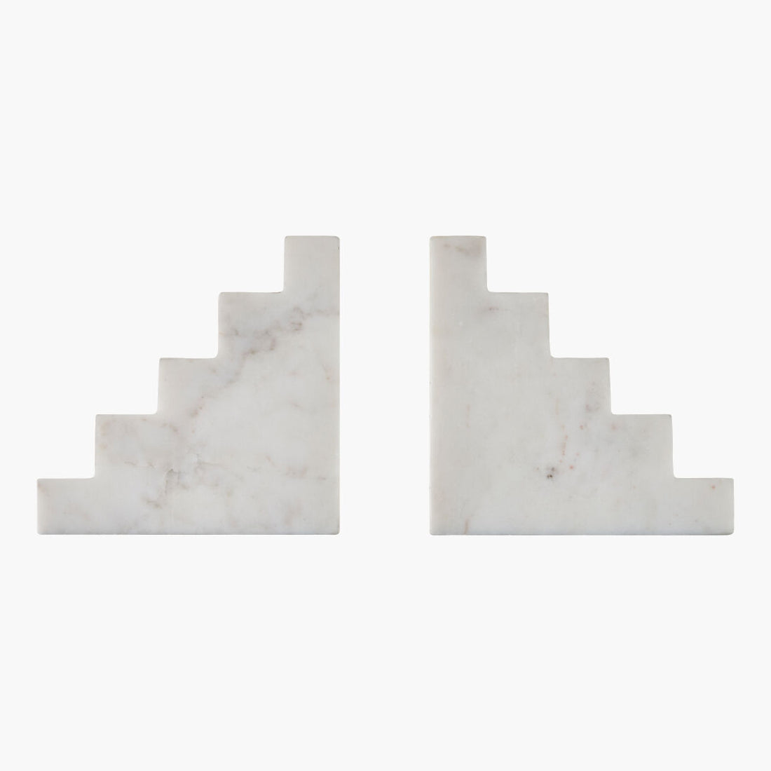 Two white marble stair bookend on a white background