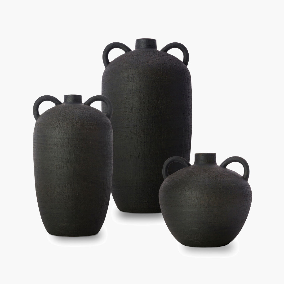 Three black ceramic vases of varying sizes on a white background