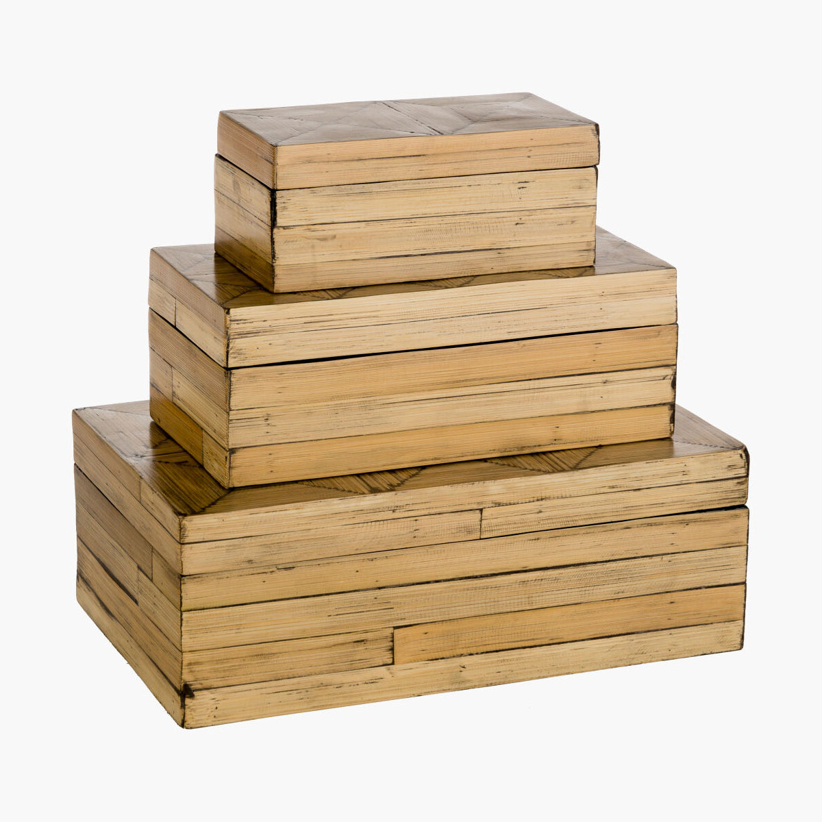 Stack of three wooden boxes with a white background