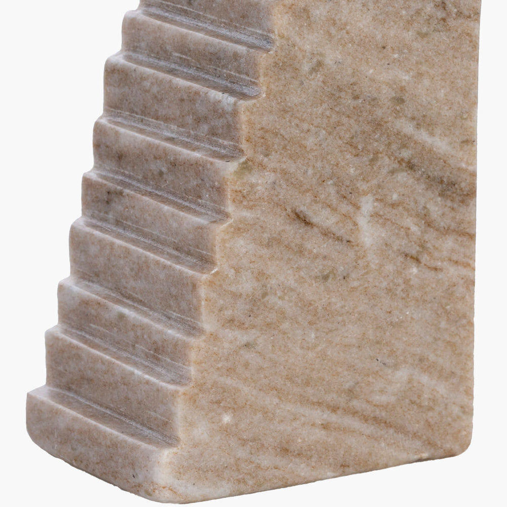 Close-up of a textured stone surface with a white background