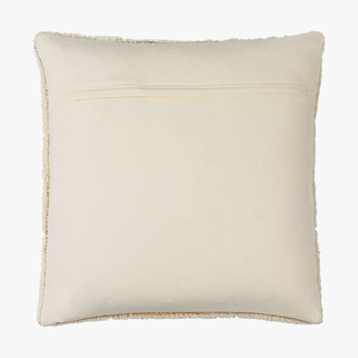 Beige pillow with textured trim on a white background