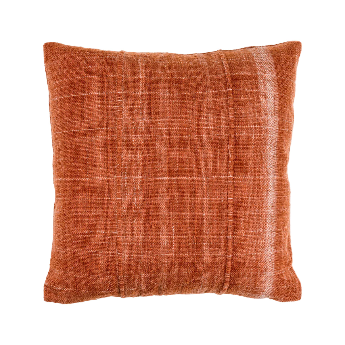 Textured orange pillow on a white background