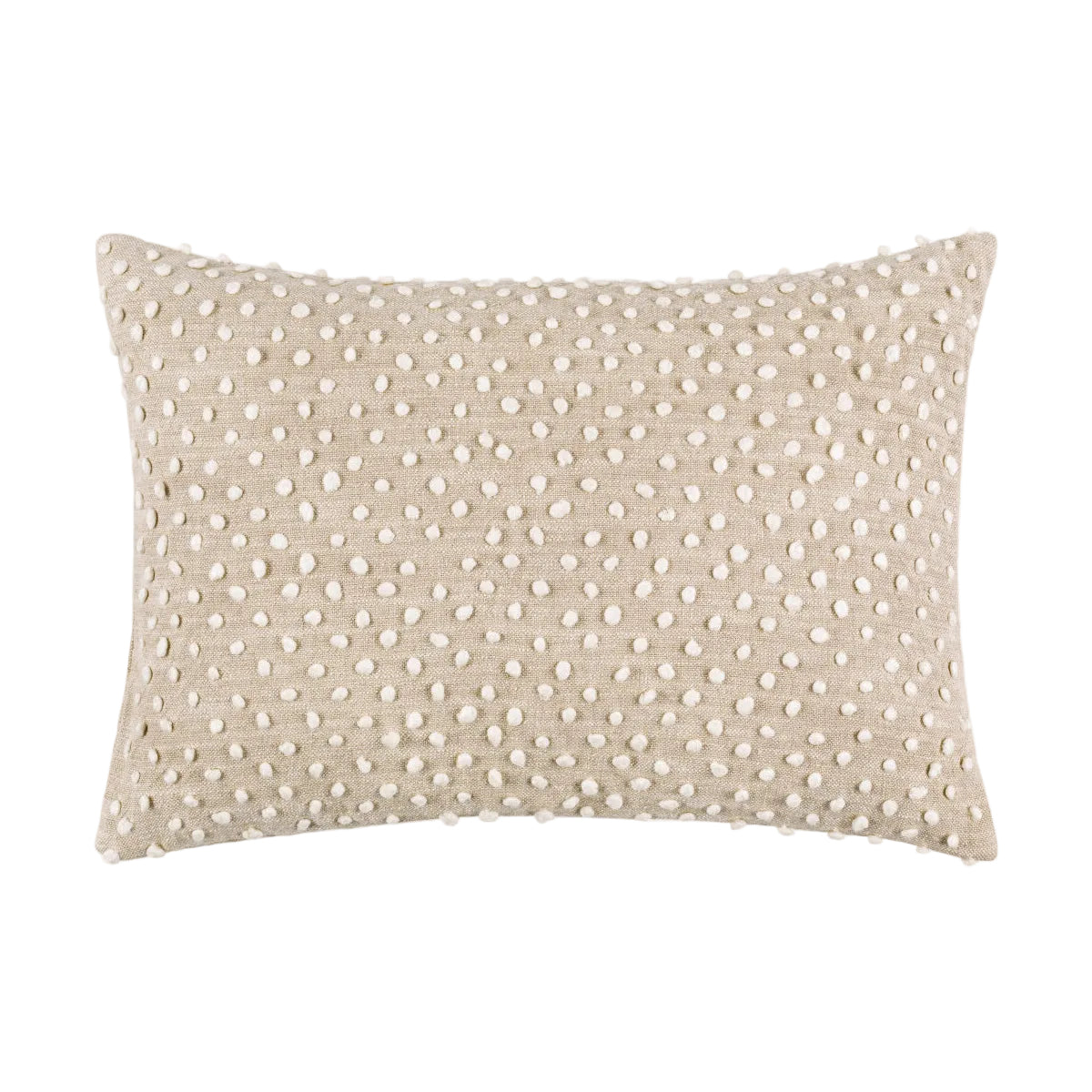 Beige pillow with white dot pattern on a white background