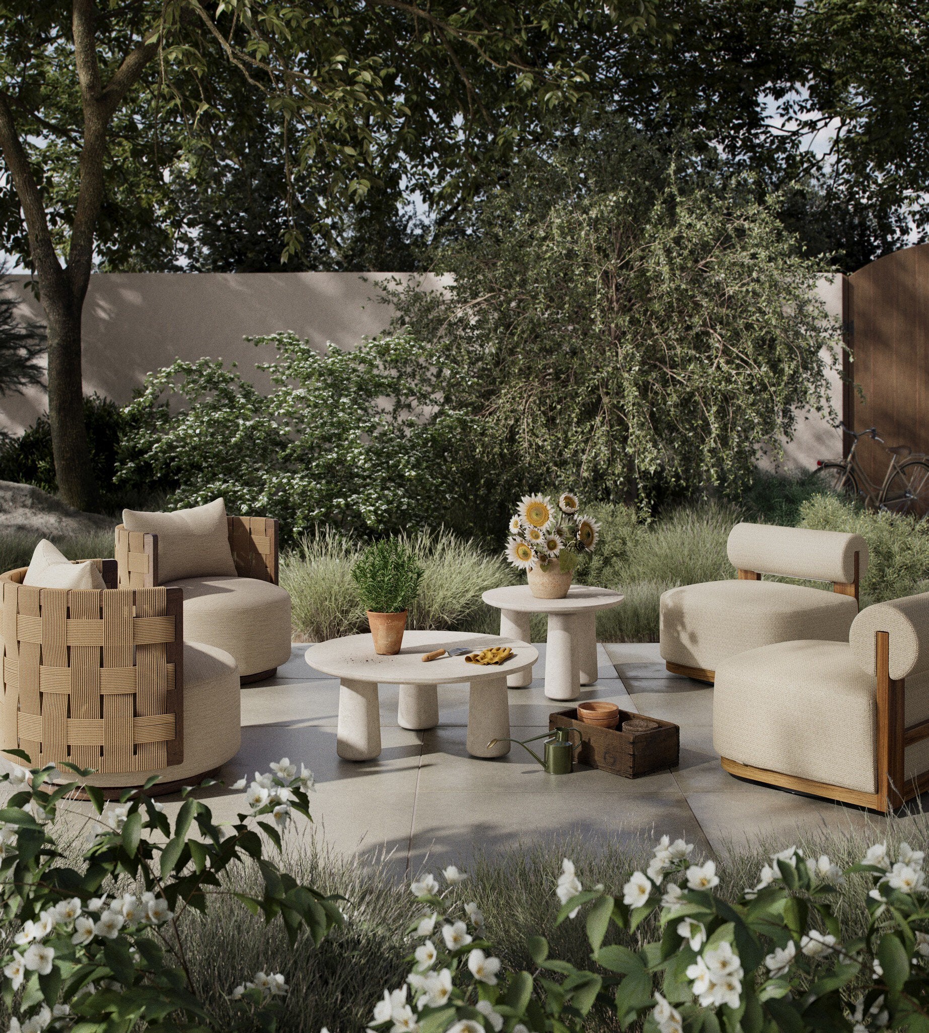 Outdoor patio setting with modern furniture and decorative elements in a garden.