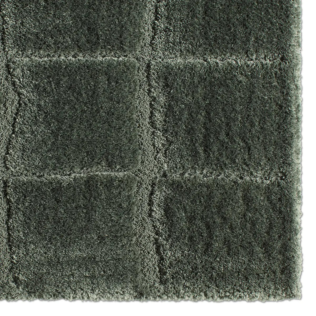 Dark green checkered patterned rug