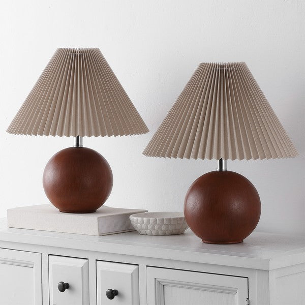 Two table lamps with pleated beige shades on a white surface.