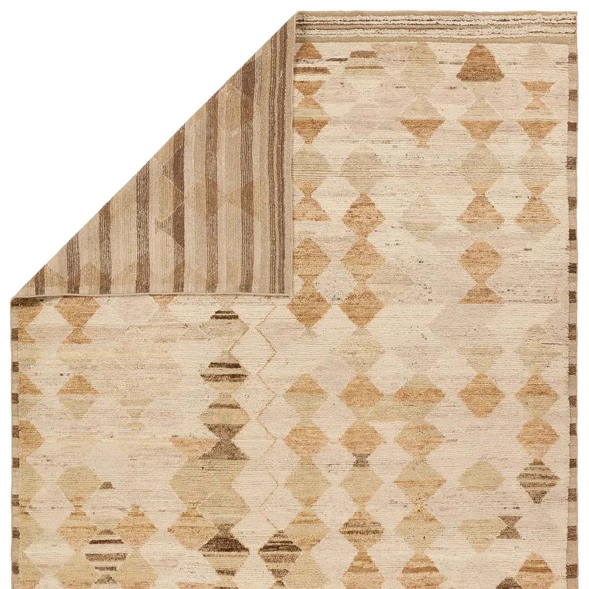 Beige and brown geometric patterned rug on a white background