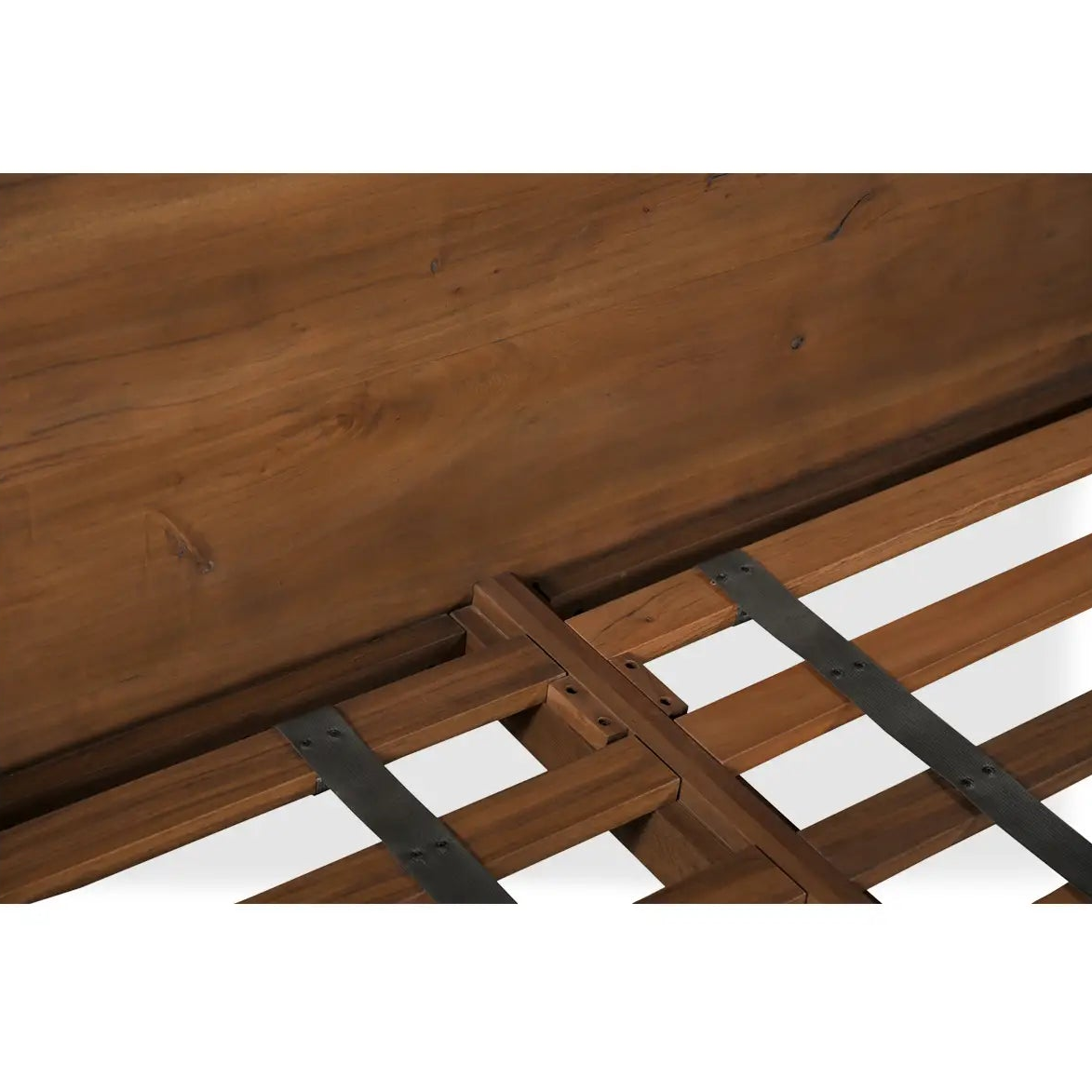 Wooden bed frame with metal slats on a white background