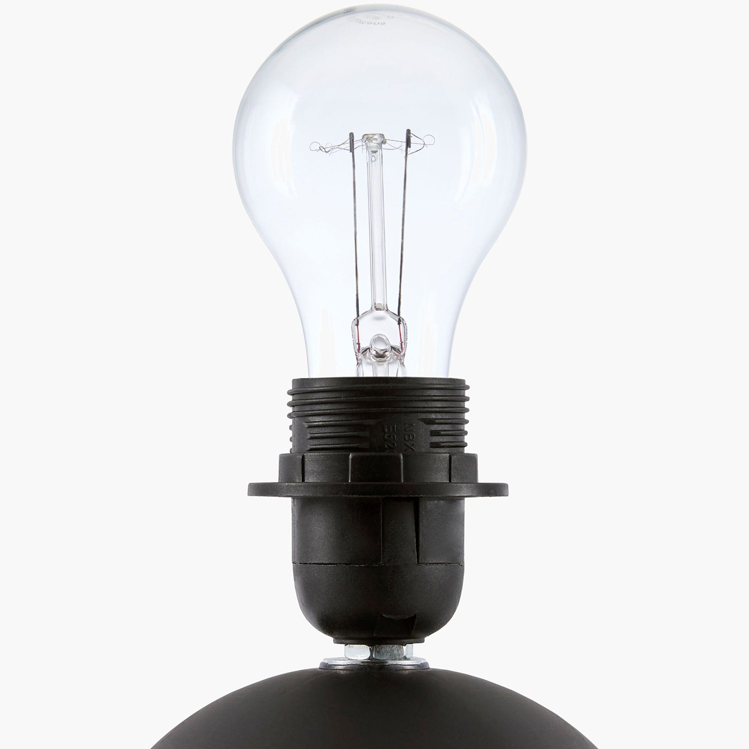 Clear light bulb with black base on a white background