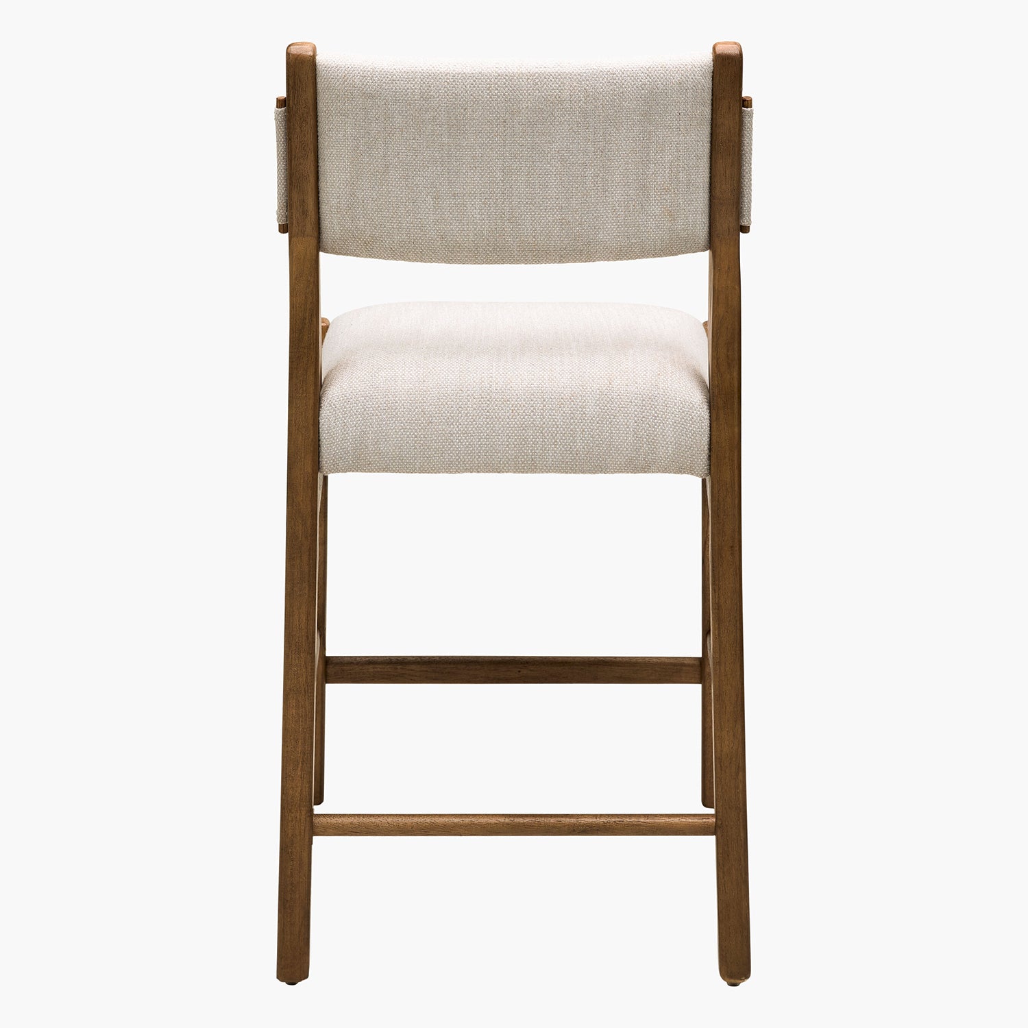 Wooden bar stool with beige cushioned seat and backrest on a white background