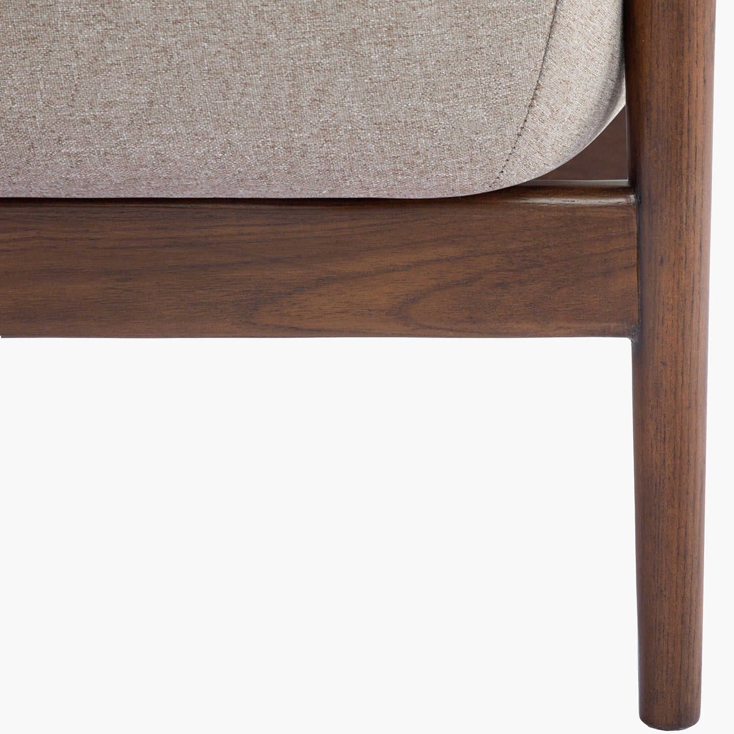 Close-up of a wooden chair with a gray cushion on a white background