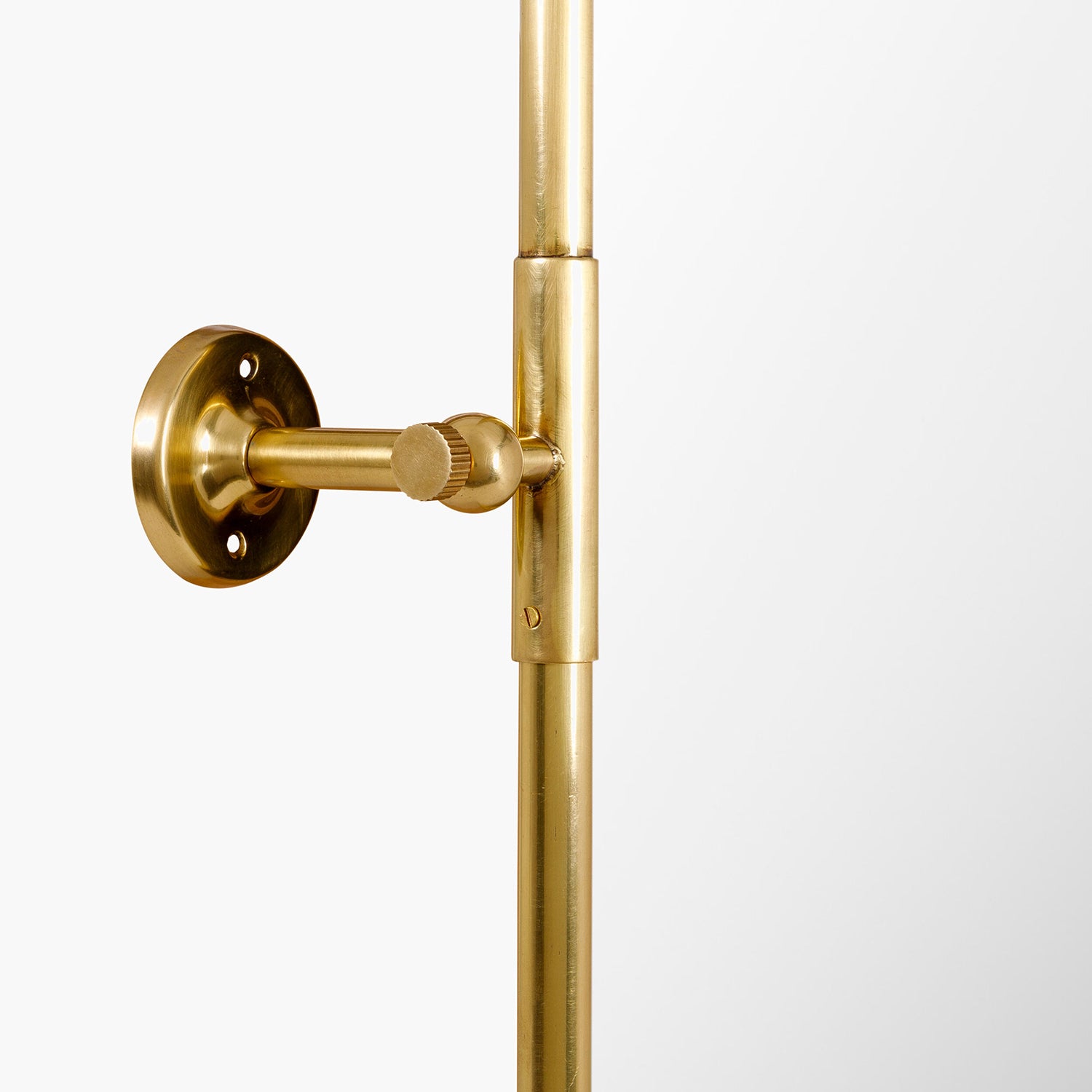 Gold door handle on a white background
