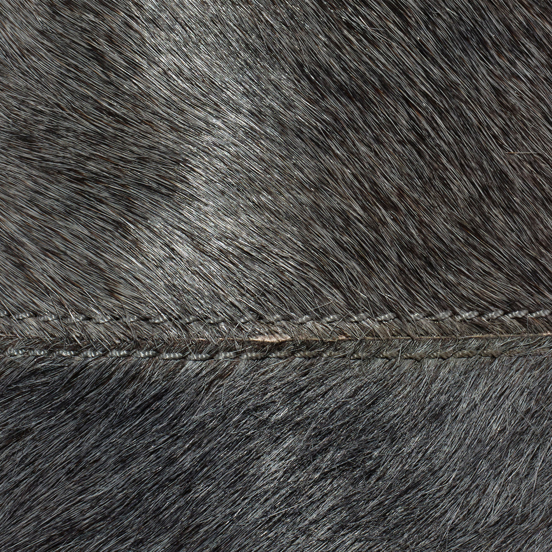 Close-up of dark brown gray with visible stitching