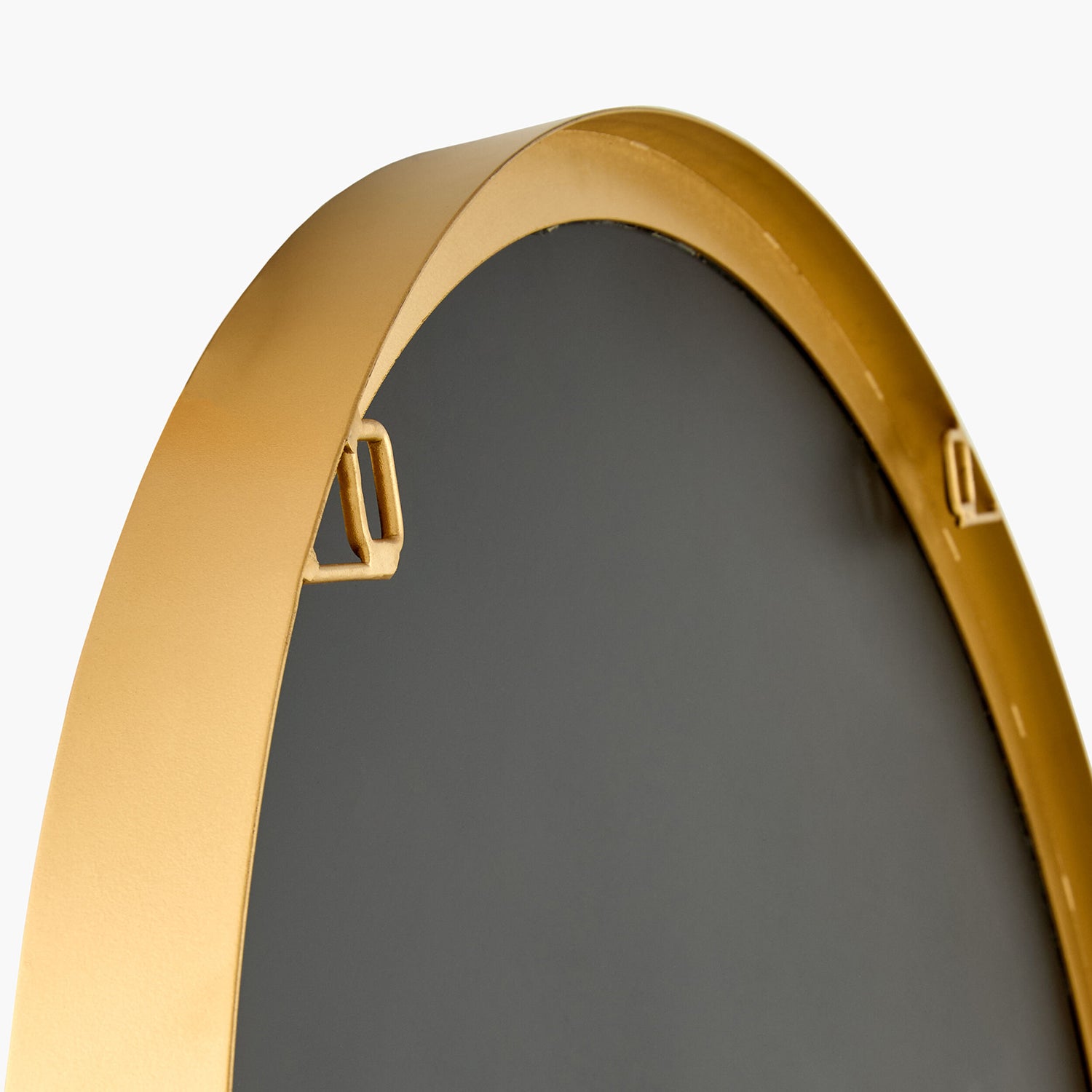 Gold-framed mirror on a white background