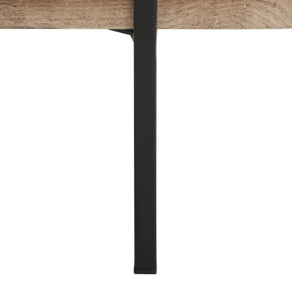 Close-up of a wooden table with a black metal leg on a white background