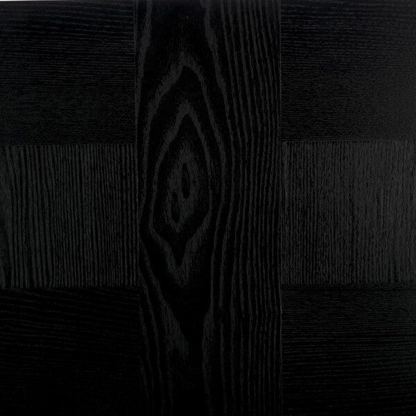 Close-up of black wood swatch with visible grain