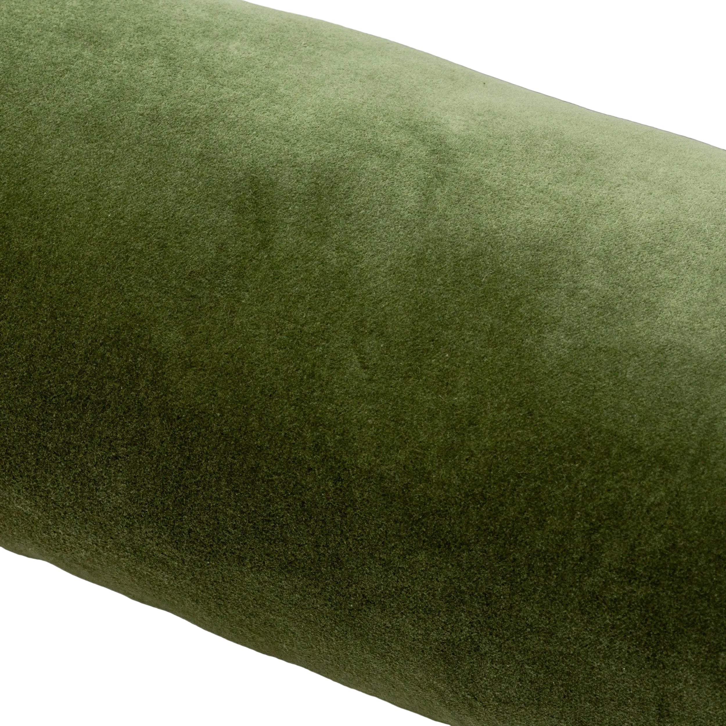 Green cushion with a textured surface on a white background