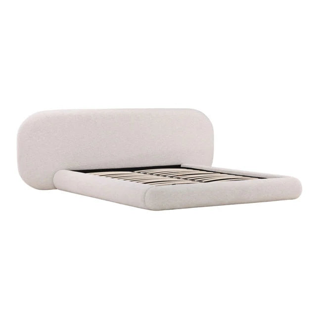 Beige upholstered bed frame on a white background