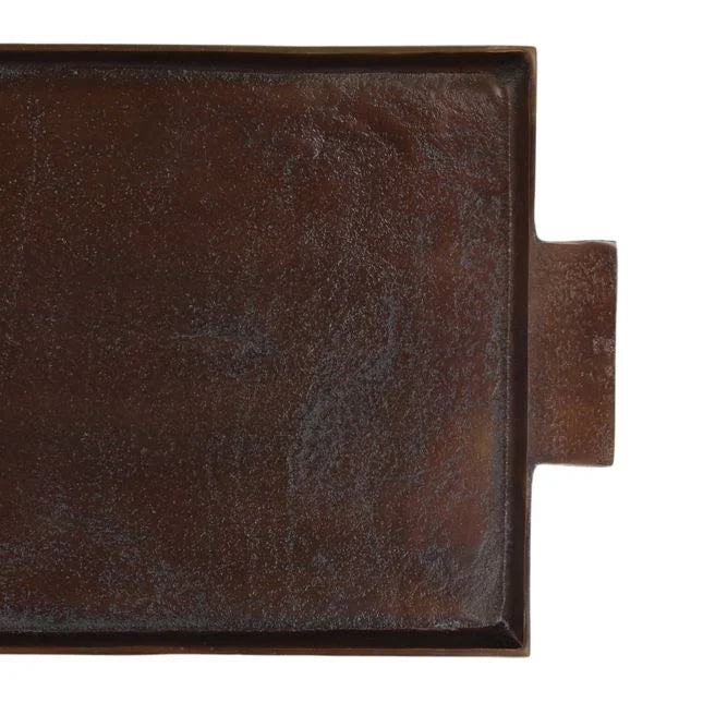 Close-up of a brown metal tray on a white background