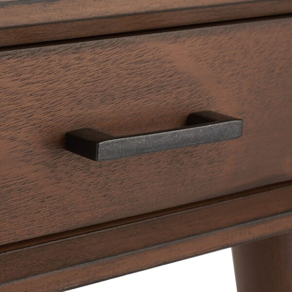 Close-up of a wooden drawer with a metal handle on a white background
