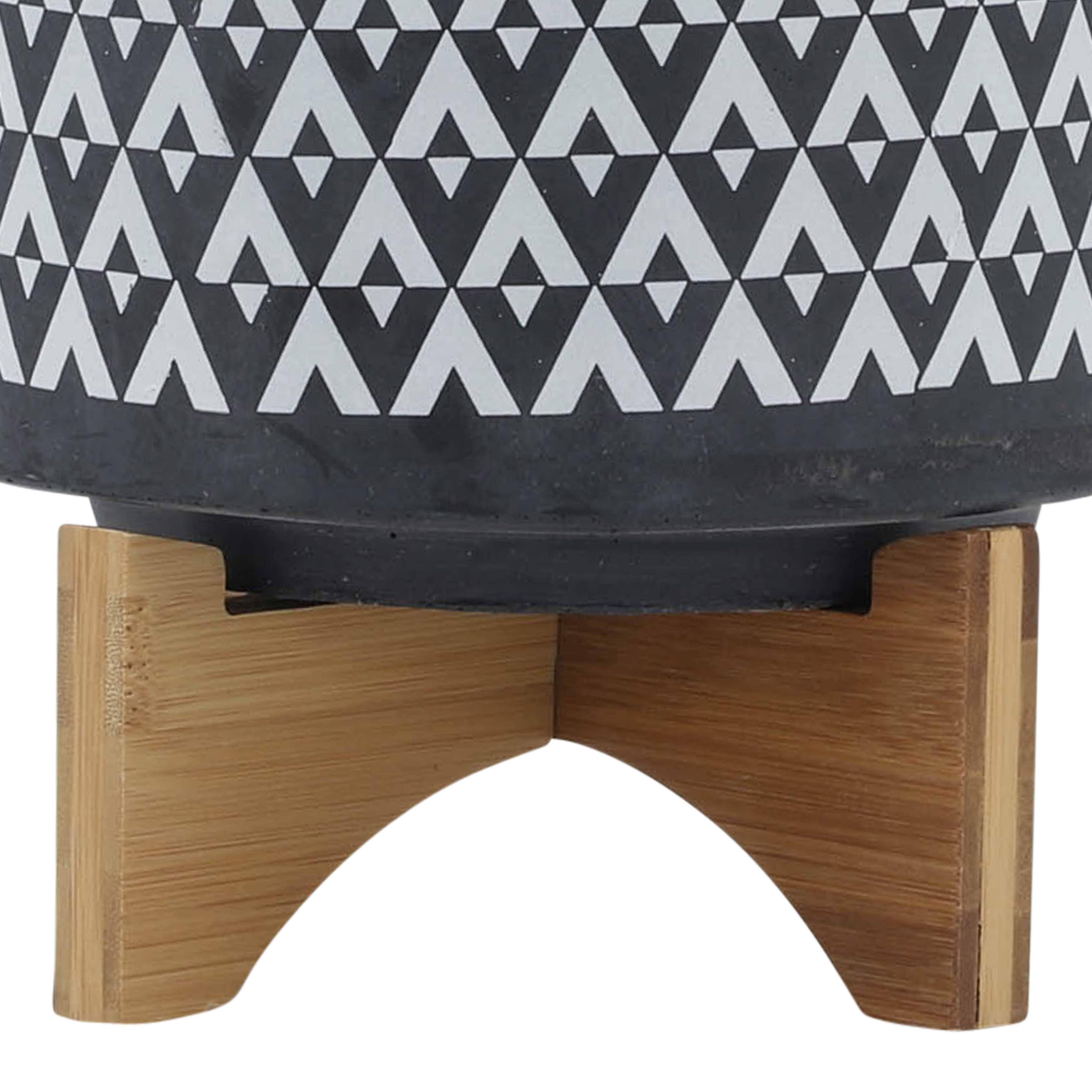 Patterned cushion with wooden base on a white background