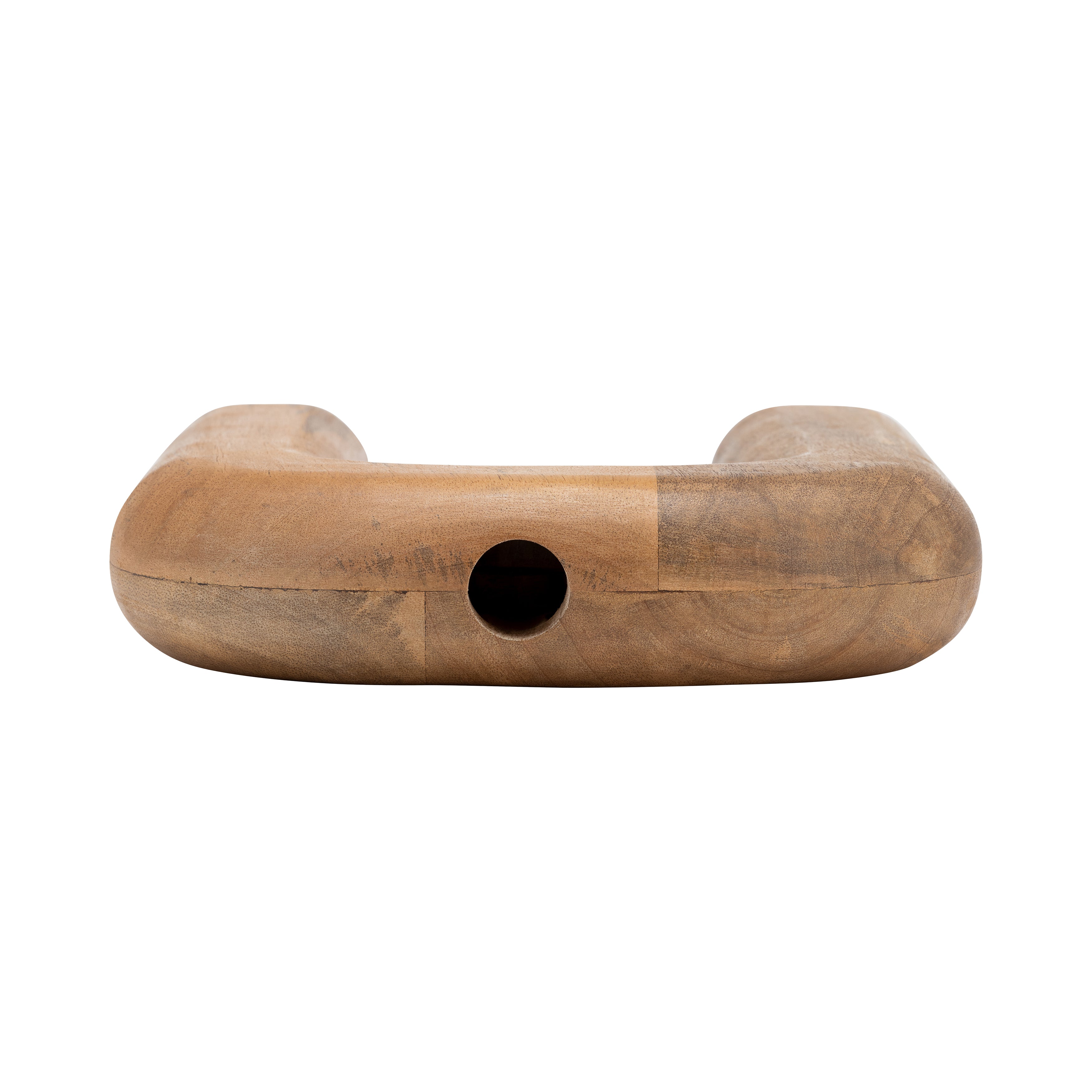 Wooden dog toy with a hole on a white background