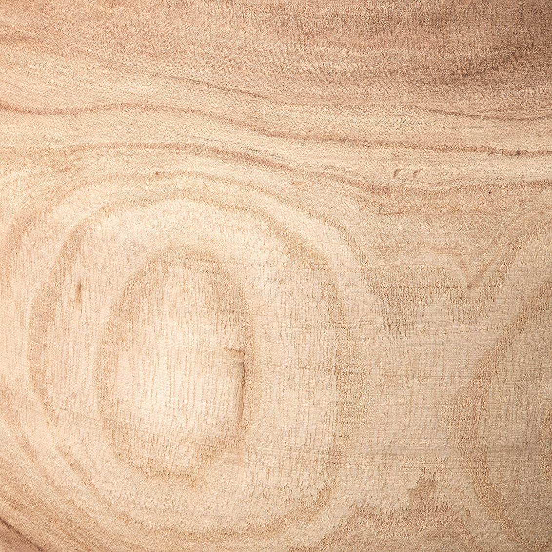 Close-up of a wooden surface with visible grain and texture