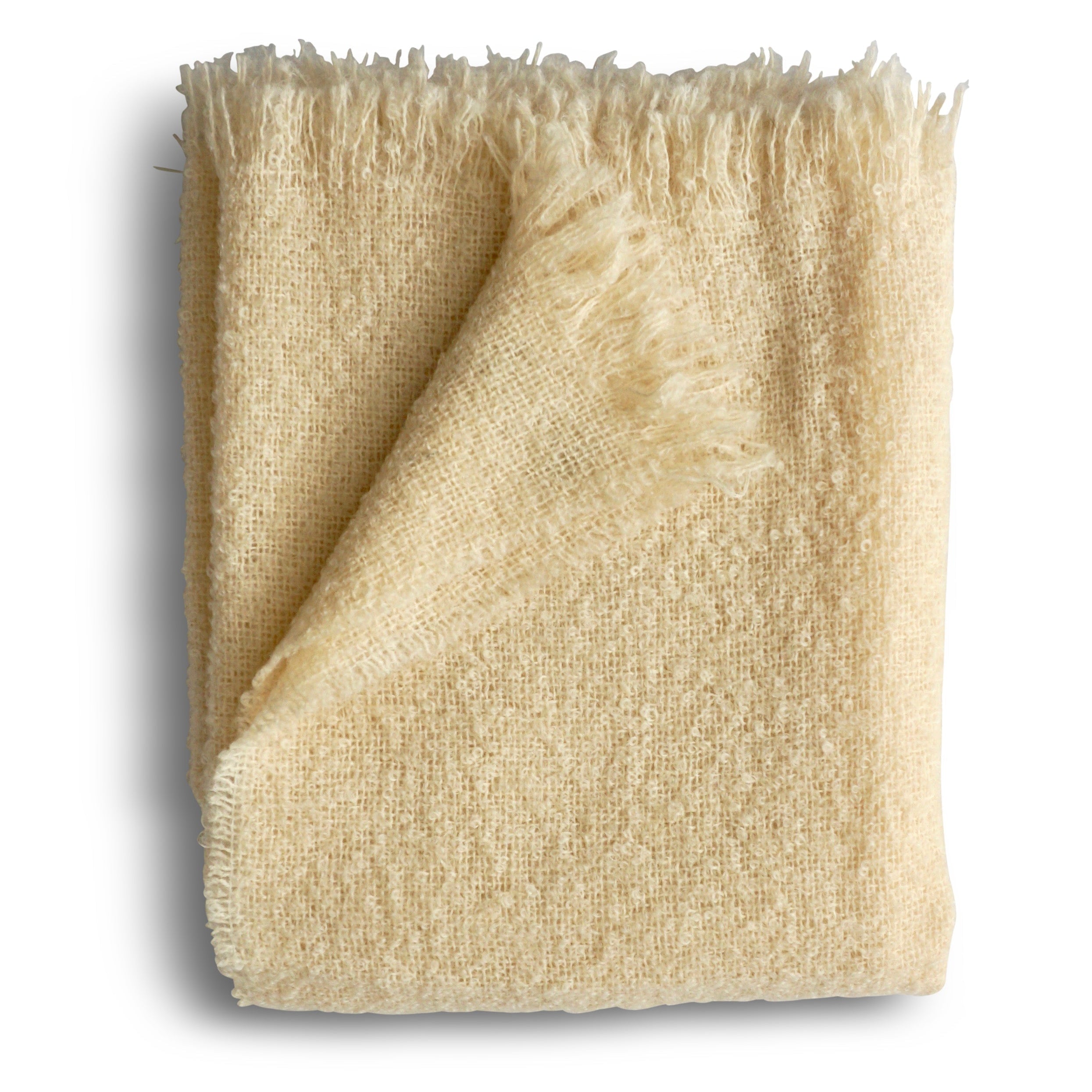 Beige textured blanket with frayed edges on a white background