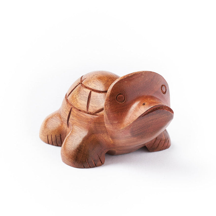Wooden turtle glasses holder on a white background