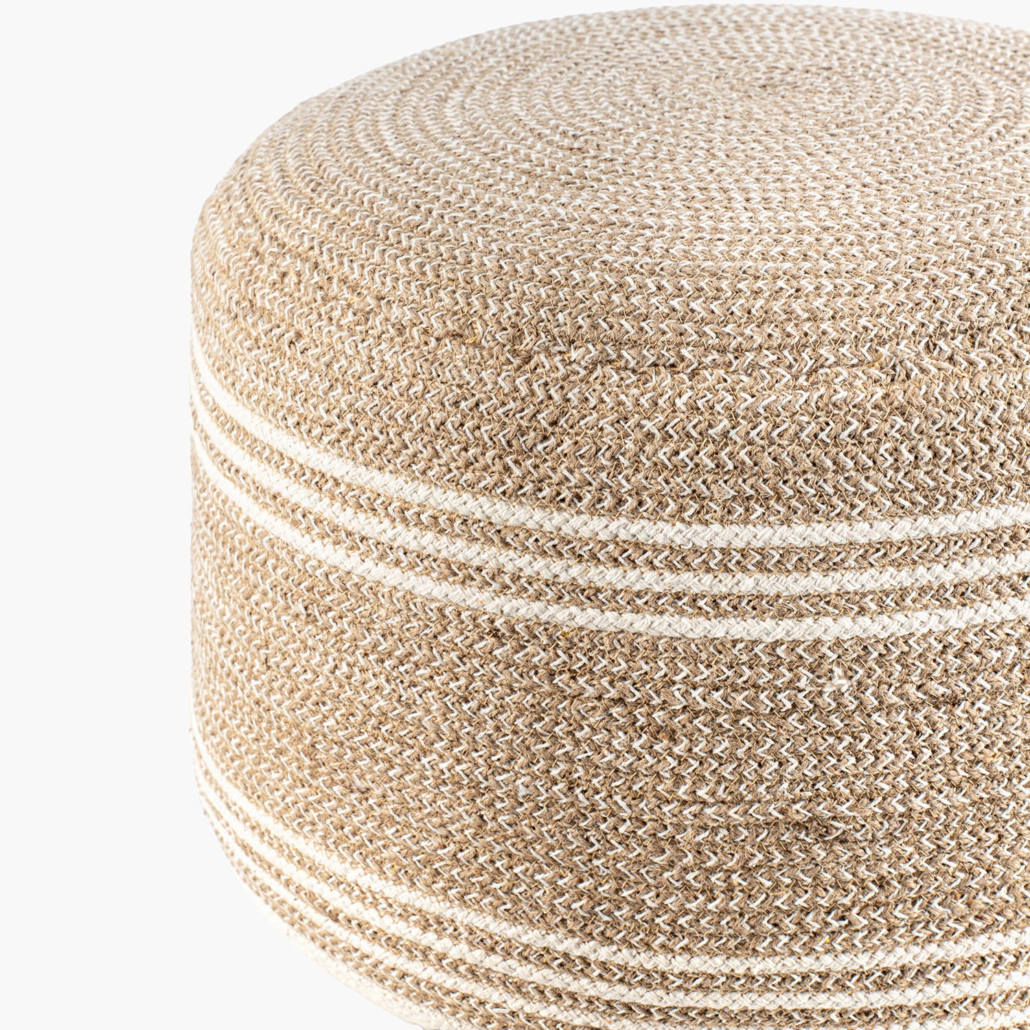 Round woven ottoman with a textured surface on a white background