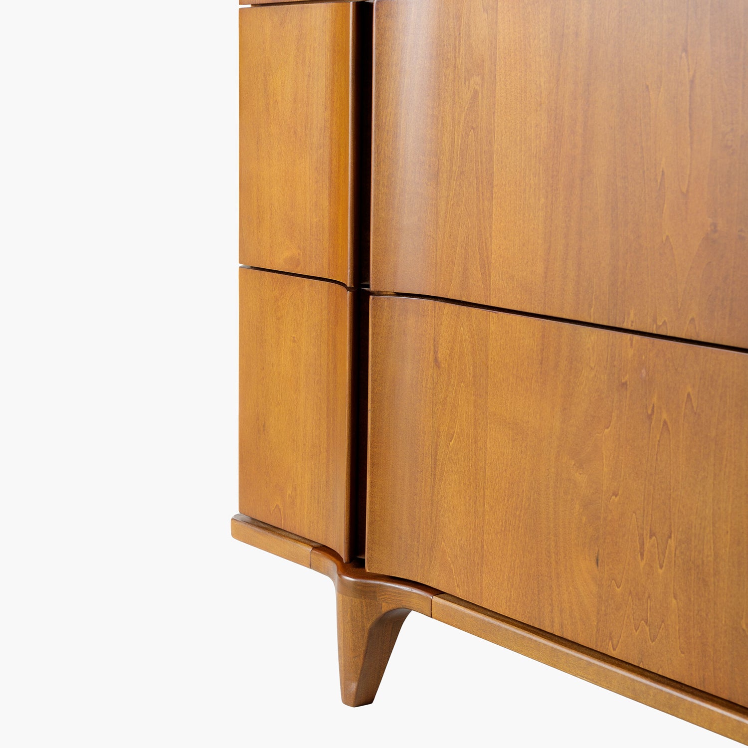 Wooden dresser with four drawers on a white background