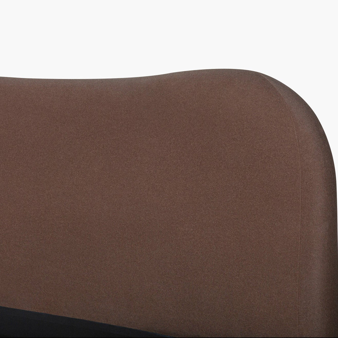 Brown upholstered headboard on a white background