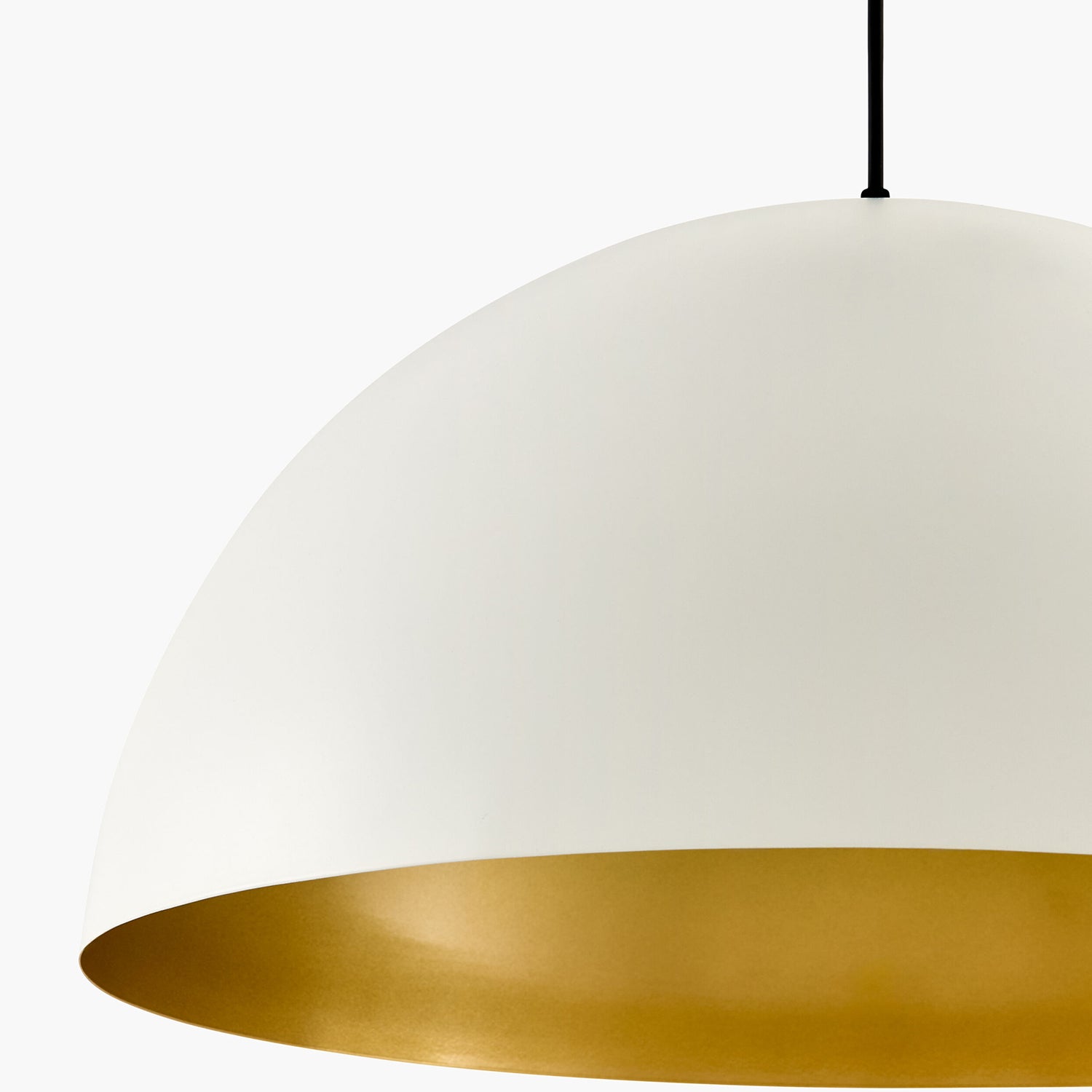Pendant light with white shade and gold base on a white background