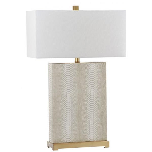 Table lamp with textured beige base and rectangular white shade on a white background