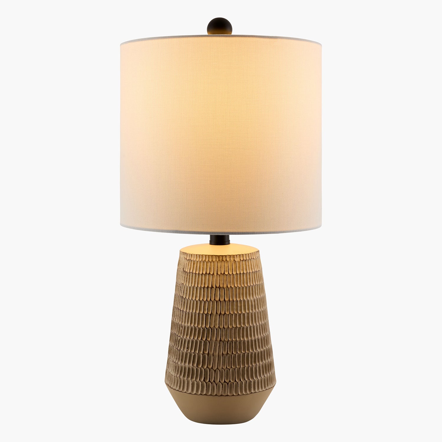 Table lamp with textured brown base and beige shade on a white background