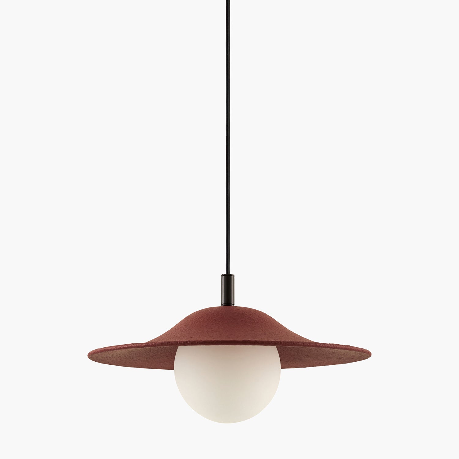 Pendant light with a brown shade and white bulb on a white background