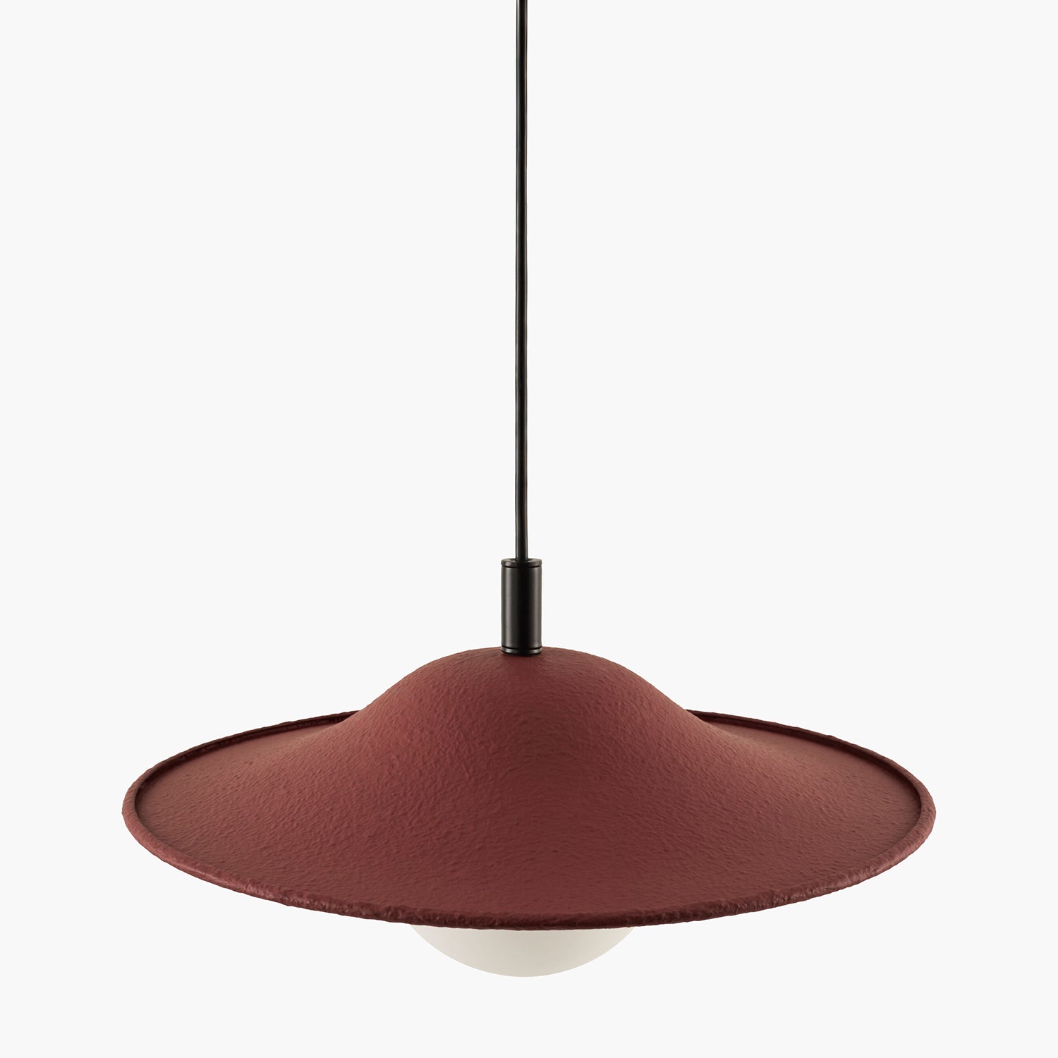 Red pendant light on a white background