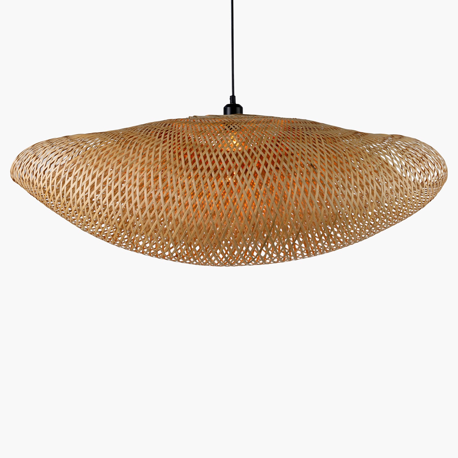 Woven rattan pendant light on a white background