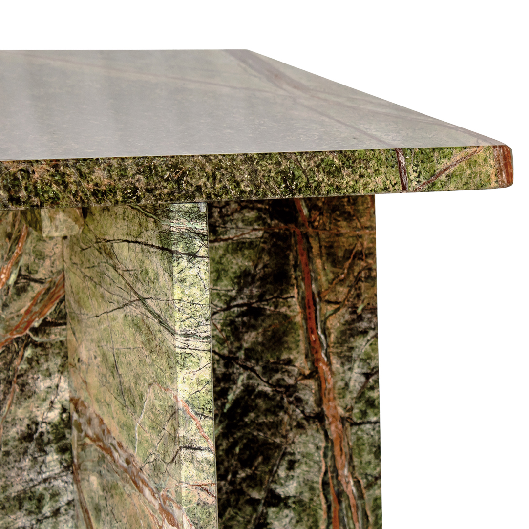 Green marble-patterned side table on a white background
