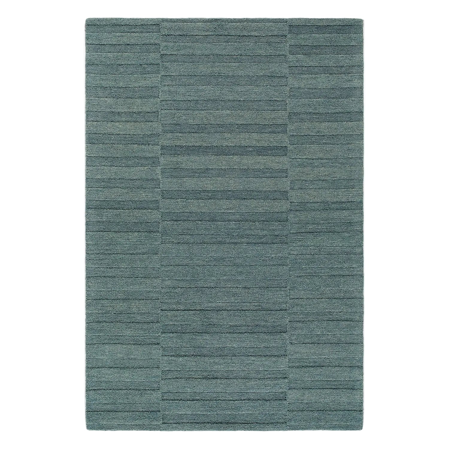Teal area rug with a striped pattern on a light gray background