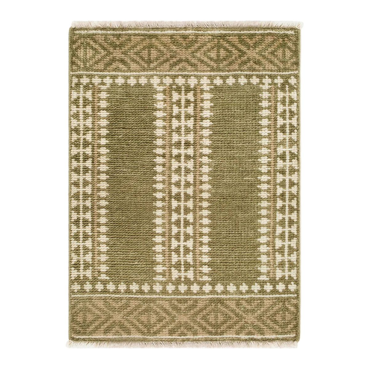 Green and beige patterned rug on a white background