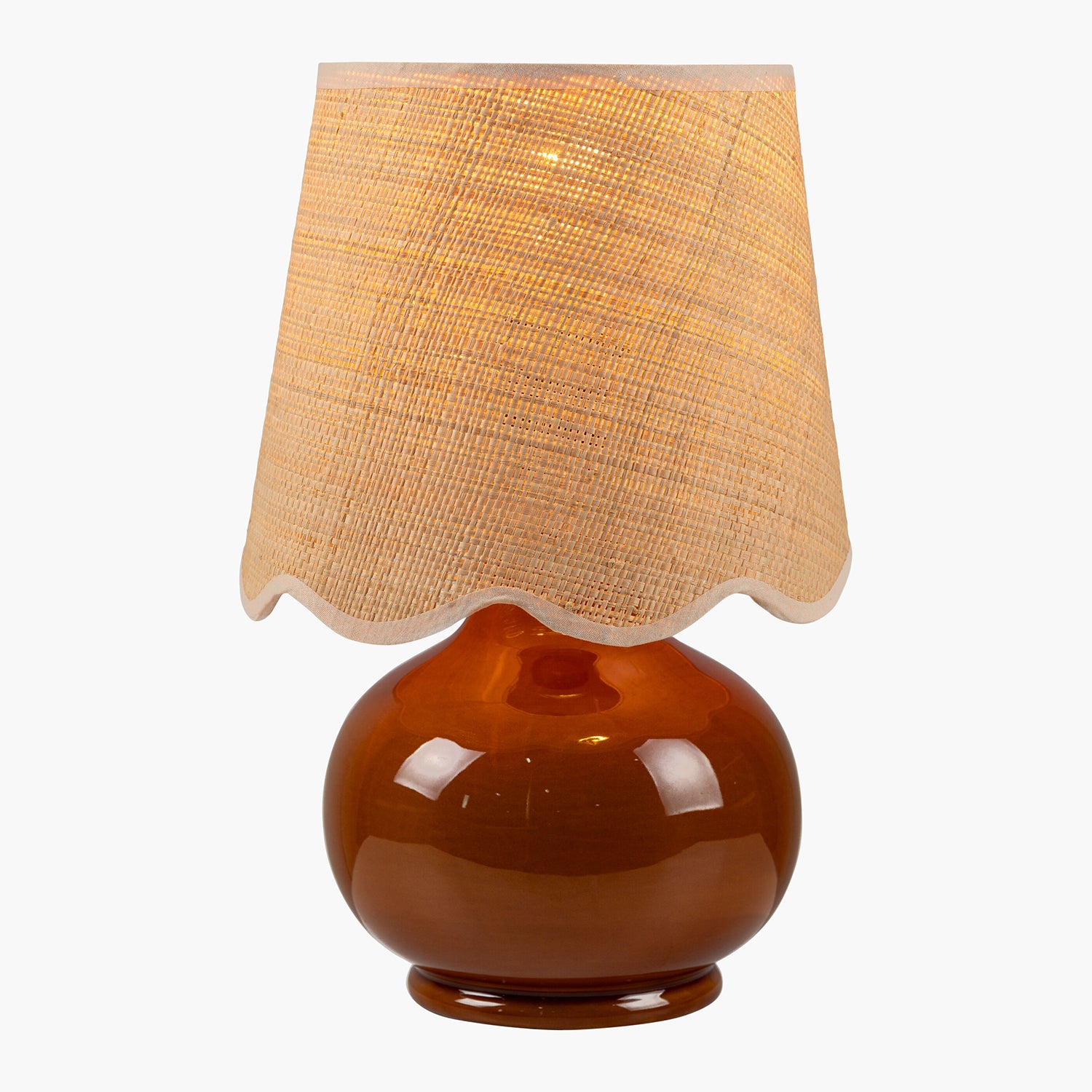 Table lamp with a brown base and beige textured shade on a white background