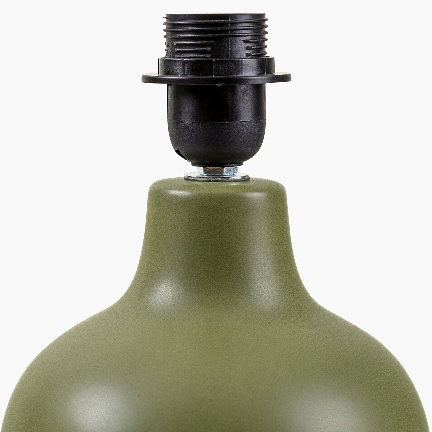 Close-up of a green lampshade with a black socket on a white background