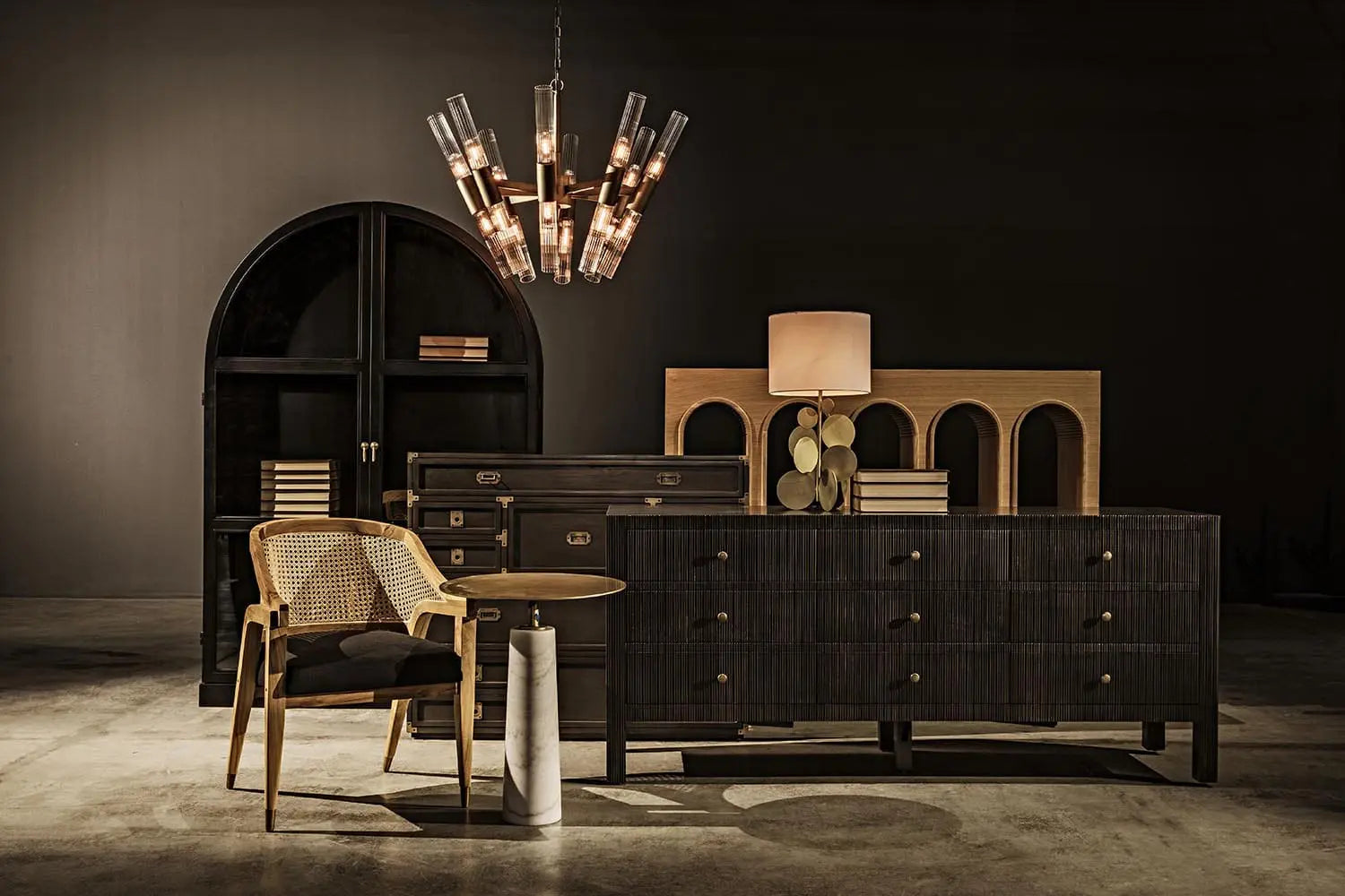 Modern interior with dark wood furniture, a chair, and a chandelier.